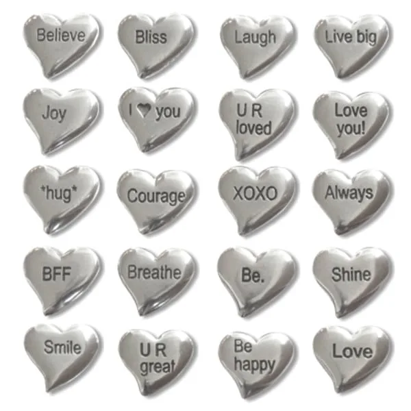 Pouch of Tiny Hearts – Tiny Heart Pocket Charms 20pc bag The Pouch of Tiny Hearts includes 20 silver, heart shaped pocket charms, each with an engraved positive or loving message such as "Believe," "Laugh," "I โฅ you," "Courage," and more.