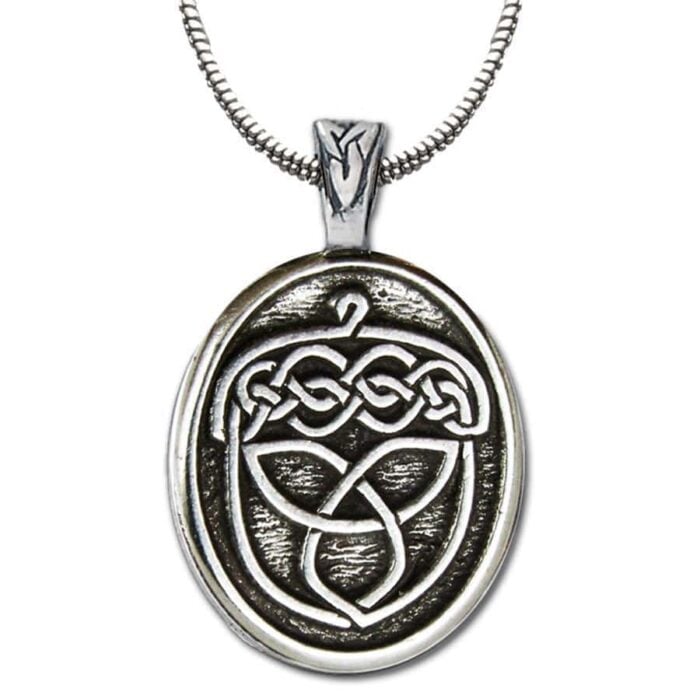 A celtic knot pendant on a silver chain. A celtic knot pendant on a silver chain.