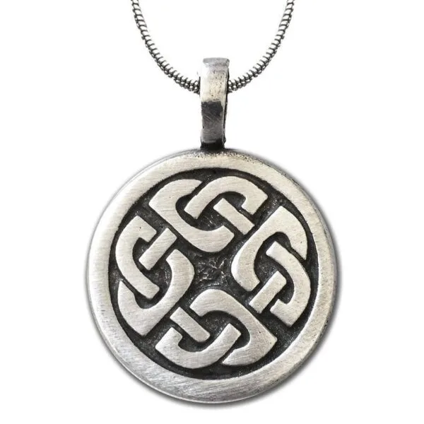 A celtic knot pendant on a silver chain.