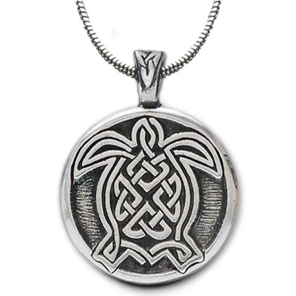 A celtic turtle pendant on a silver chain. A celtic turtle pendant on a silver chain.