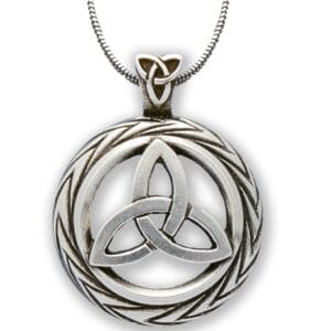 A silver celtic knot pendant on a silver chain.