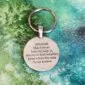 A Viking Wayfinder Keychain with a quote on it that reads, i love my weather.