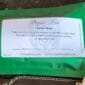 A bag of dried tea with a label on it.