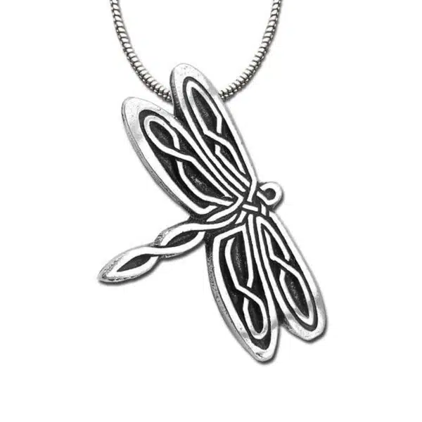 A dragonfly pendant on a silver chain. A dragonfly pendant on a silver chain.