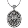 A pendant with an image of a deer on it.