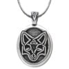 A pendant with an image of a fox on it.