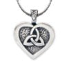 A heart shaped pendant with a celtic knot on it.