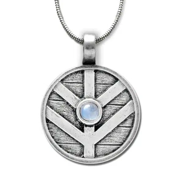 A silver pendant with a blue stone on it.