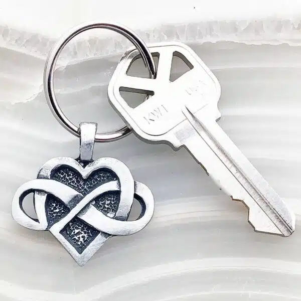 An infinity keychain with a heart on it. An infinity keychain with a heart on it.