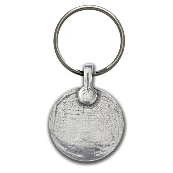 A silver key ring with a circle on it.