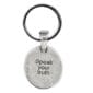 A silver keychain that says speak your truth.