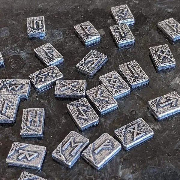 Viking symbols on a piece of metal.