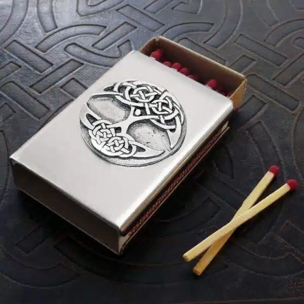 A matchbox with a celtic design on it.