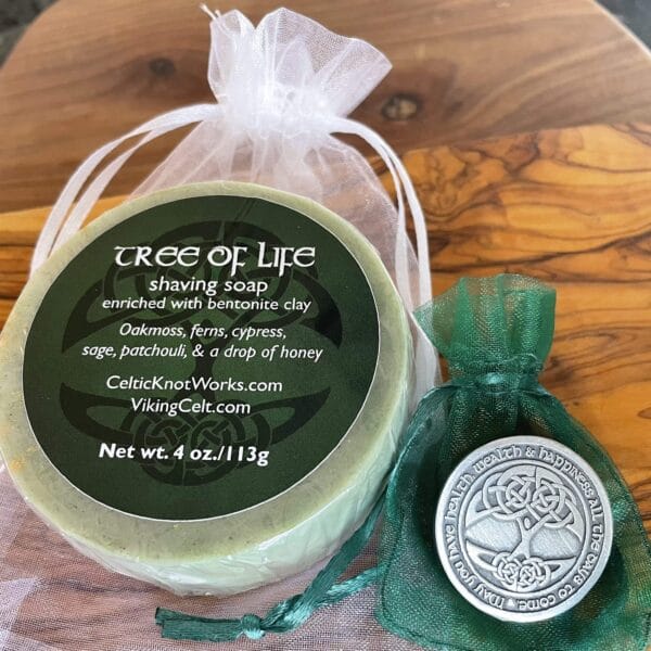 Tree of life soap on a wooden cutting board.