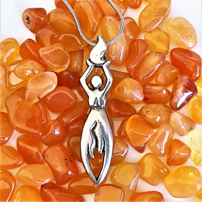 A Fire Elemental Necklace with a woman on it.