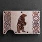 A Celtic Bear Titanium Minimalist Wallet featuring a bear design.