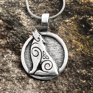 A howling wolf, with 2 mystic spirals and a celtic knot