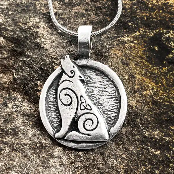 A howling wolf, with 2 mystic spirals and a celtic knot